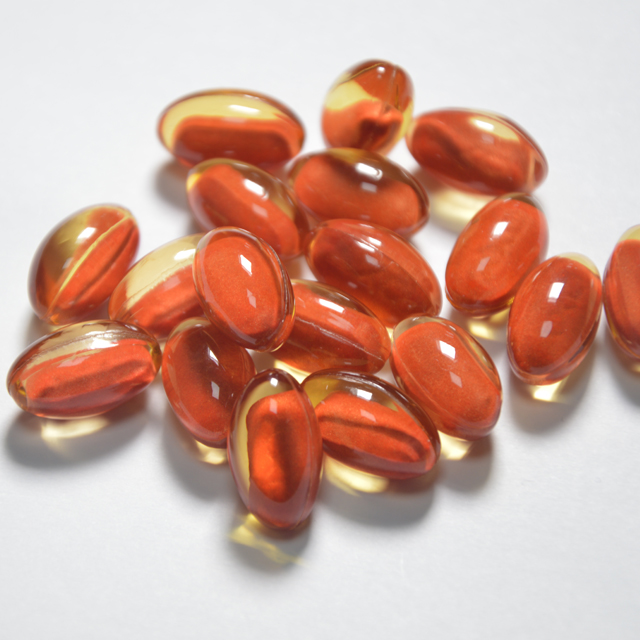 Tablets encapsulated in soft capsules